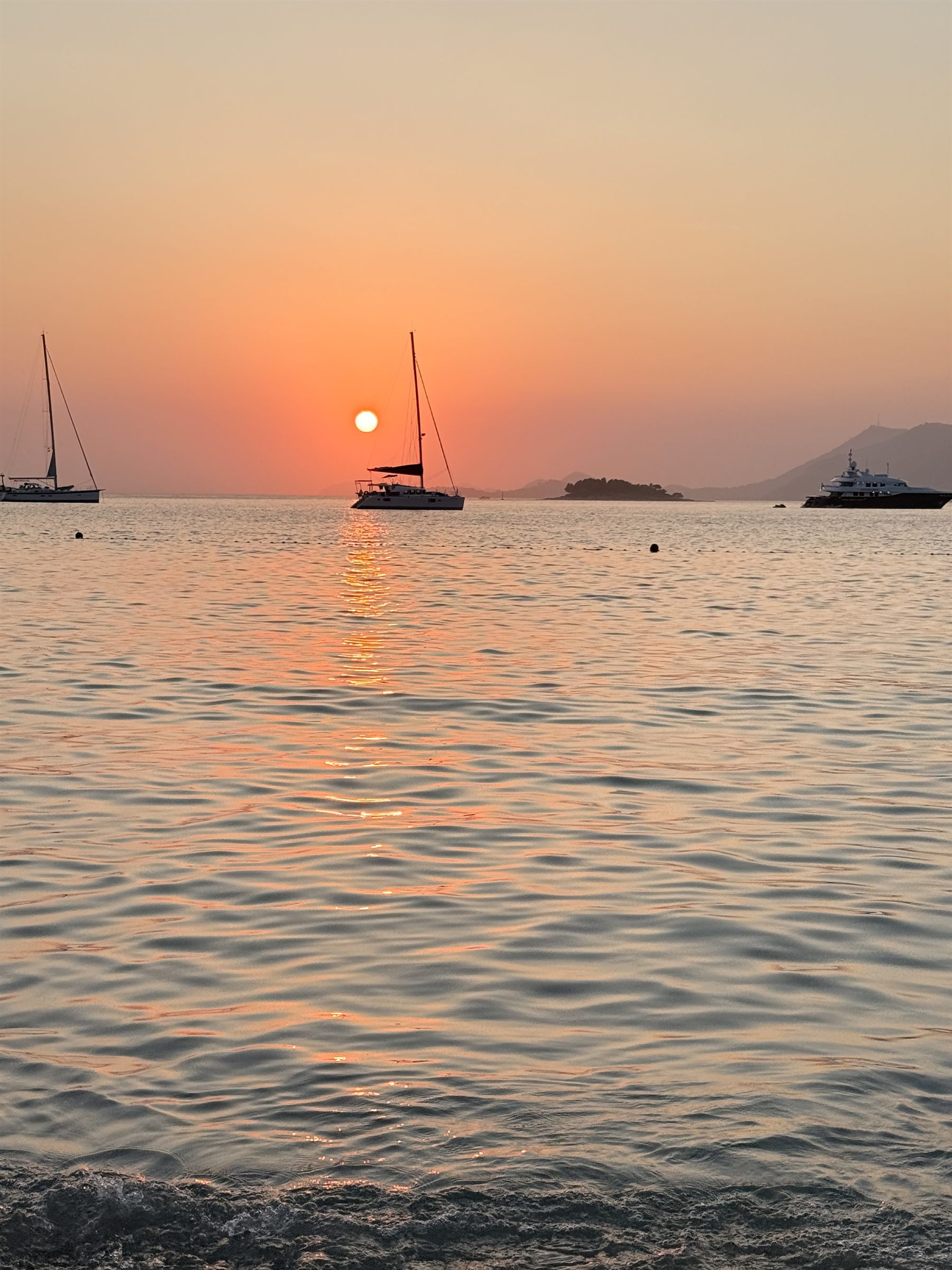 Sailboat silhouetted against the Adriatic sunset