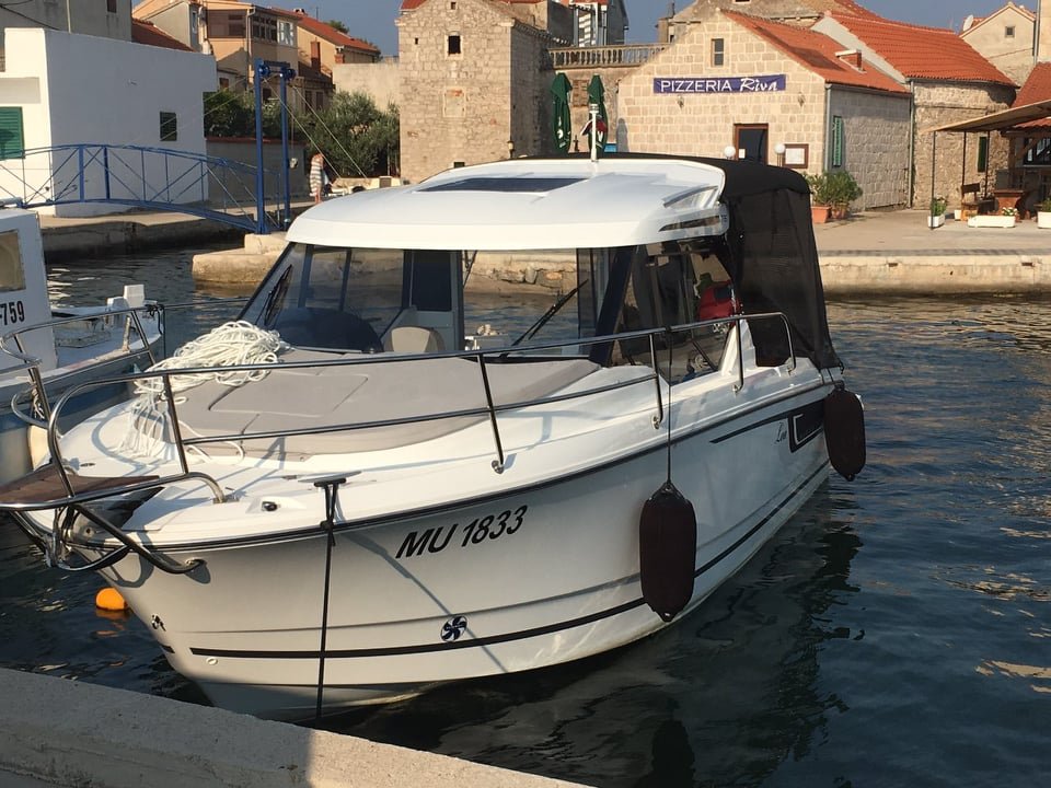 Merry Fisher 795 moored in the old port