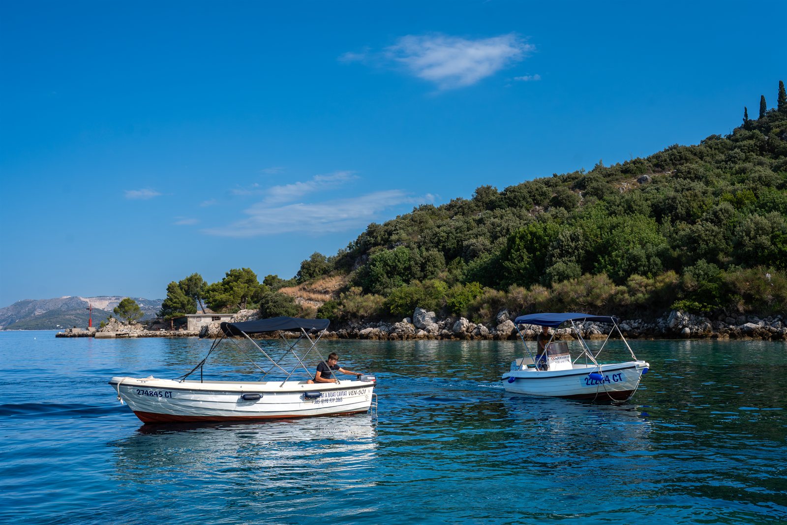 VEN 501 anchored in a quiet bay