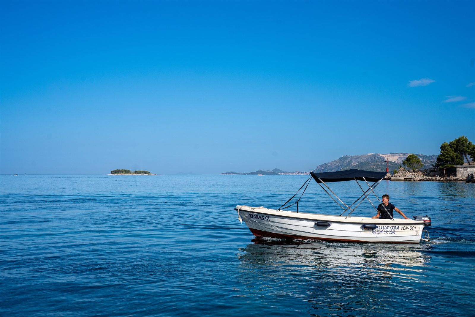 VEN 501 beside a wooded islet
